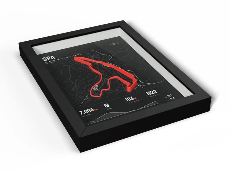 The finished frame: print, track, spacer and glass inside a matte black wooden frame, with the backing board behind.